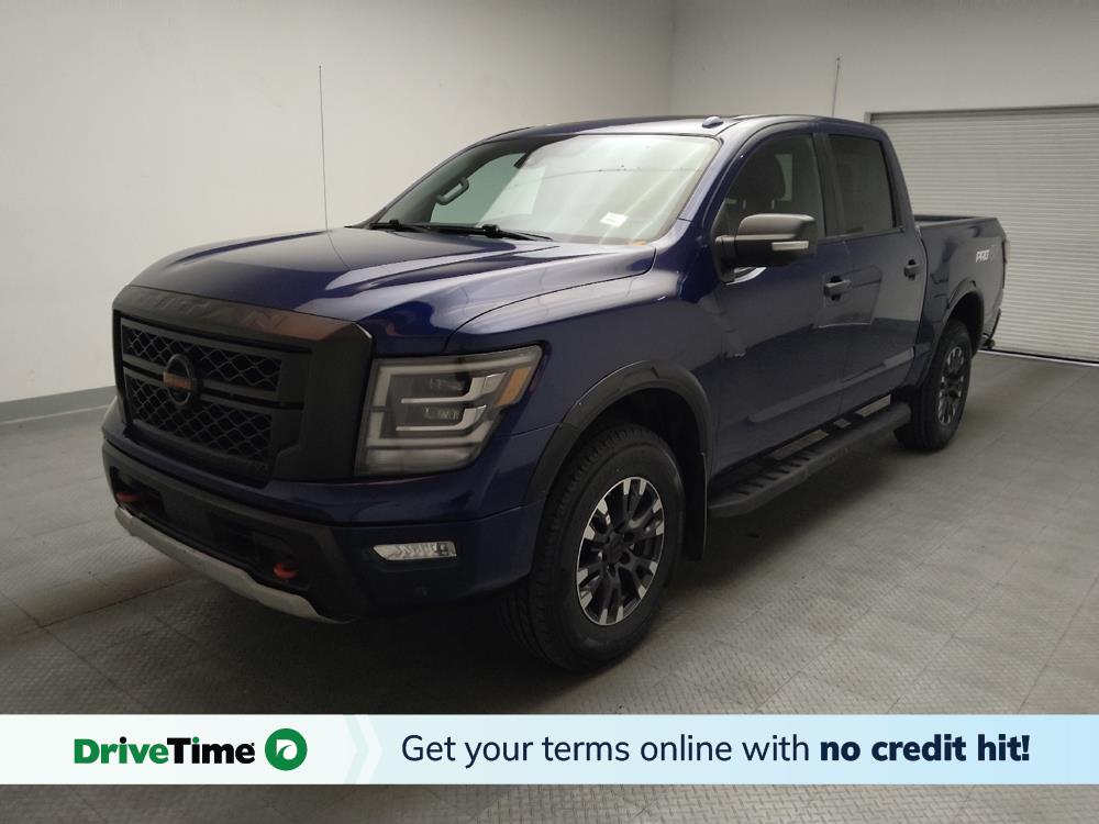 Blue 2021 Nissan Titan Pickup Truck Four-Wheel Drive 9-Speed Automatic